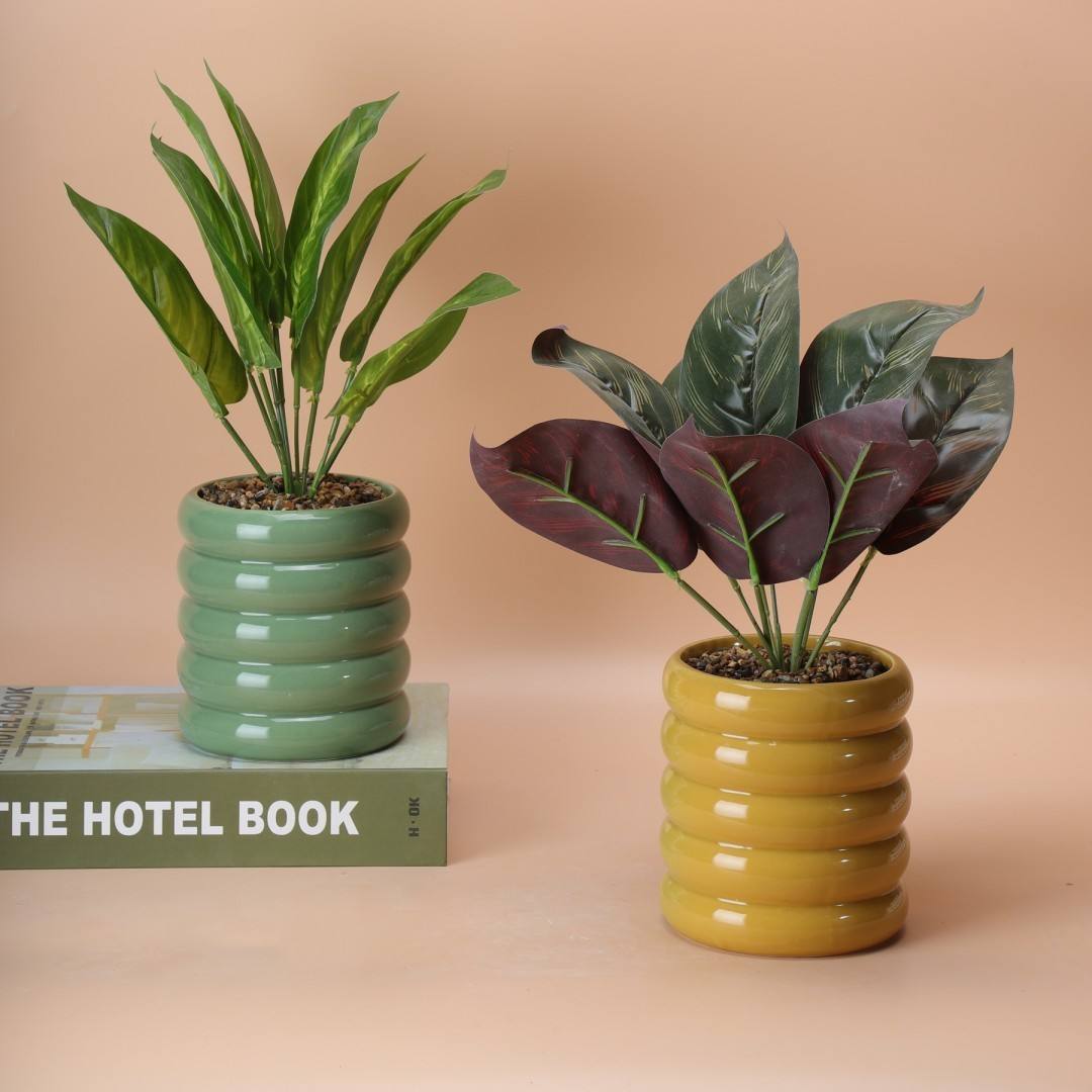 Hancai Cheap Small Ceramic Flower Pot Indoor Round Shape Flower Pots With Plastic Greenery