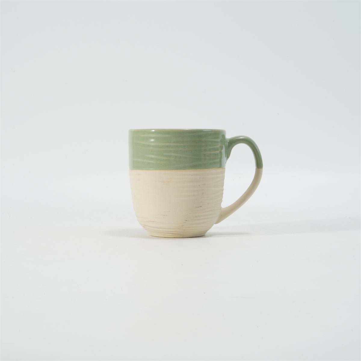 Hancai Embossed reactive glaze mug with unglaze half-part