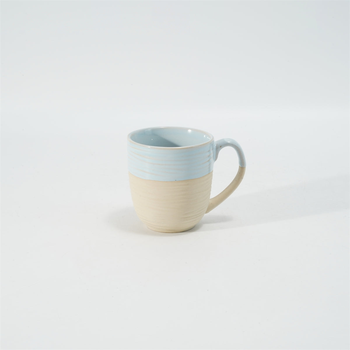 Hancai Embossed reactive glaze mug with unglaze half-part